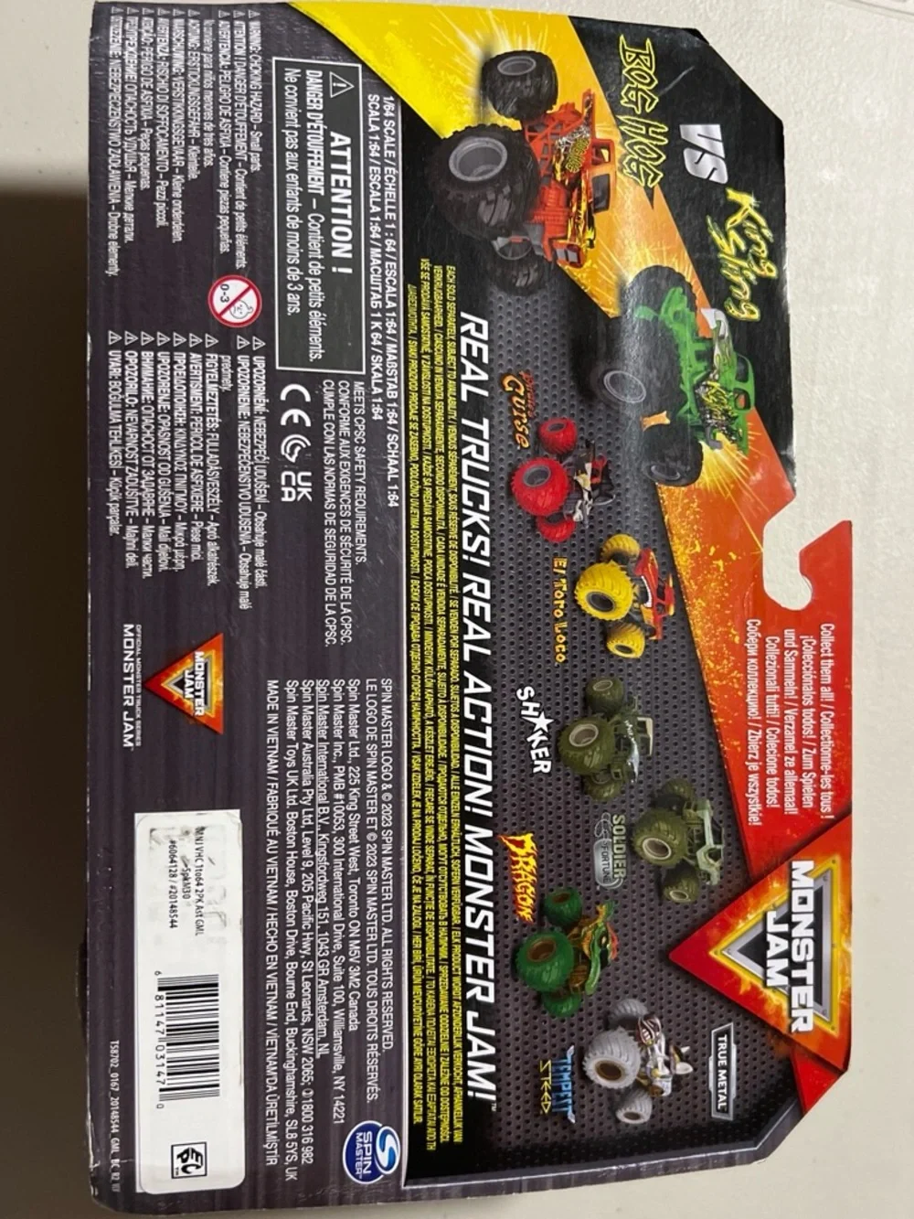 Monster Jam Bog Hog vs King Sling Monster Truck Toy Set - Green & Orange